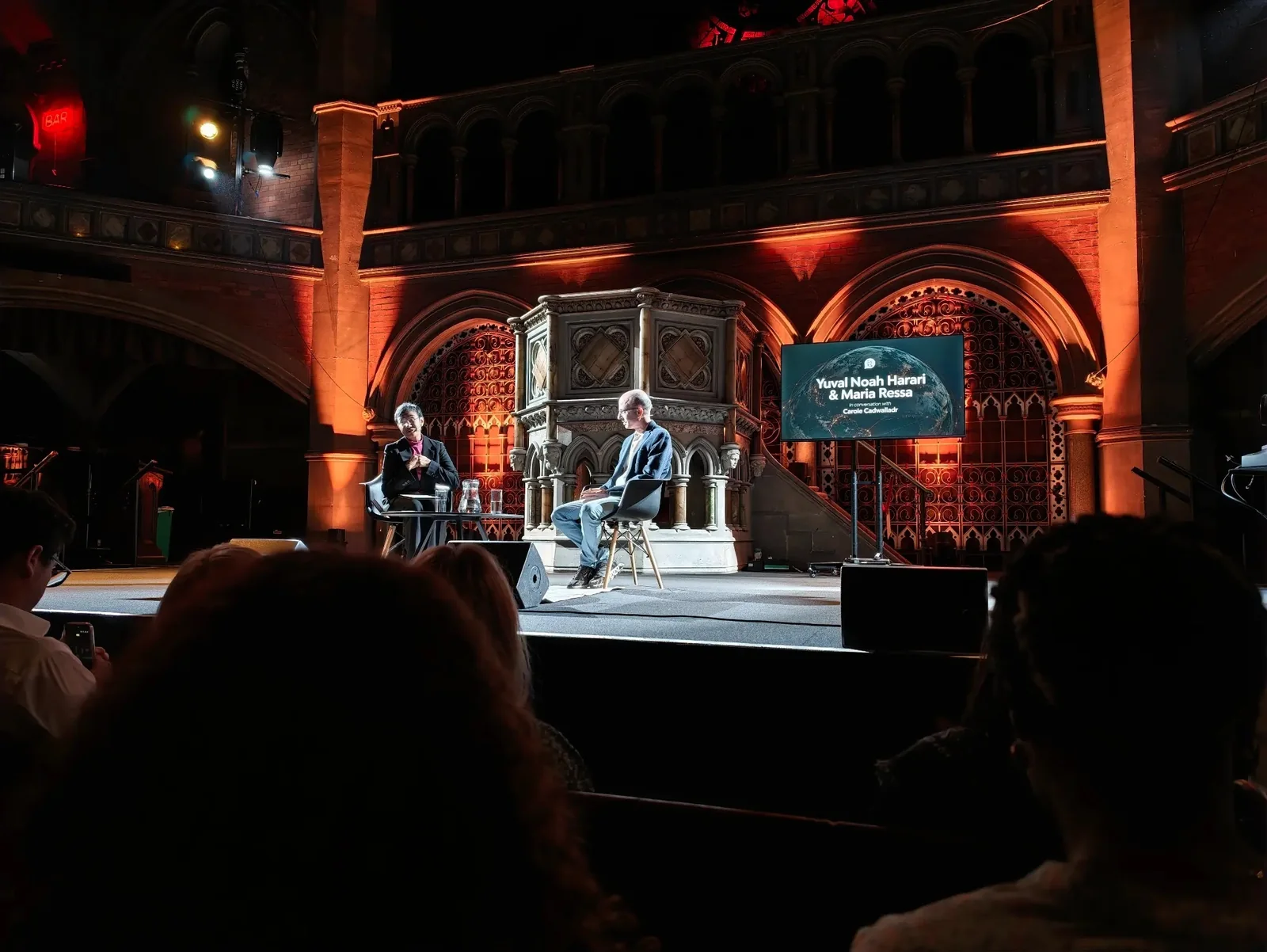 Maria Ressa and Yuval Noah Harari on stage at Union Chapel in London